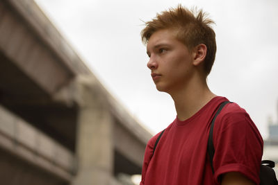 Portrait of young man looking away