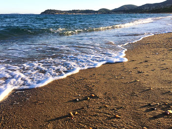 Scenic view of beach against sky