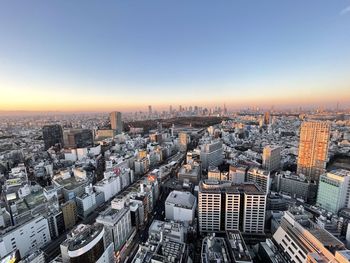 High angle view of townscape against sky during sunset