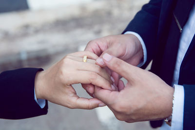 Couple holding hands