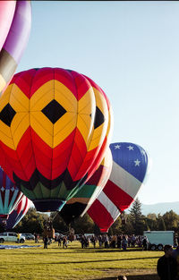 Multi colored hot air balloon against clear sky