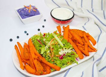 Close-up of food in plate on table