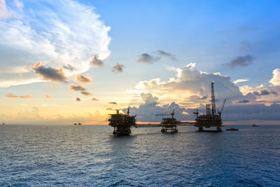 Silhouette of an oil production platform during sunset at offshore terengganu oil filed