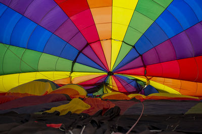 Multi colored hot air balloons flying