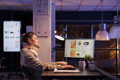 Man using laptop on table