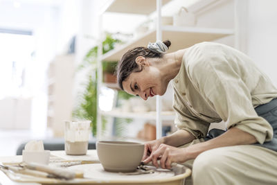 Side view of man with coffee cup