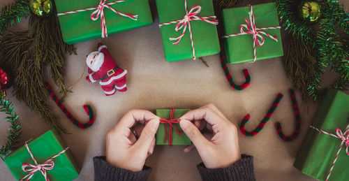 High angle view of woman with christmas decorations