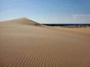 Scenic view of desert against sky