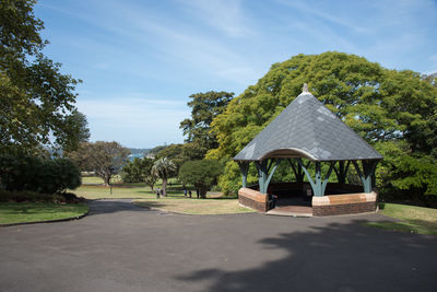 Built structure on landscape against sky