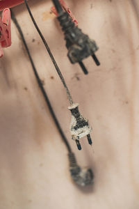 High angle view of cigarette hanging on wood