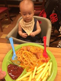 Close-up of boy eating food