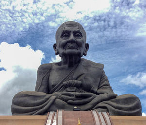 Low angle view of statue against sky