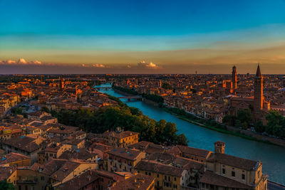 High angle view of river amidst buildings in city