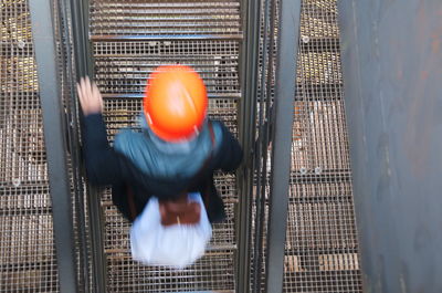 Close-up of cage in the dark