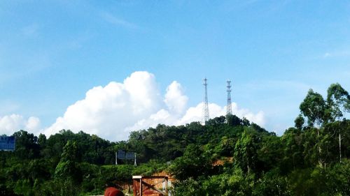 Low angle view of smoke stack against sky