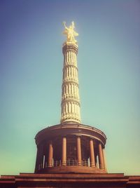 Low angle view of eiffel tower against clear sky