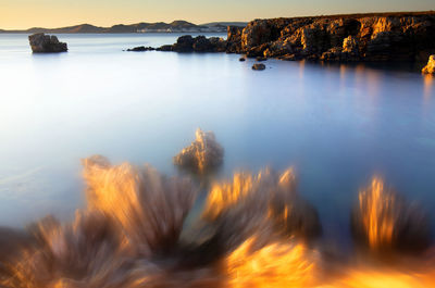 Rough coastline of menorca island at dusk