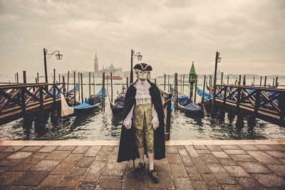 Rear view of man on pier