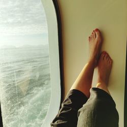 Low section of woman on beach