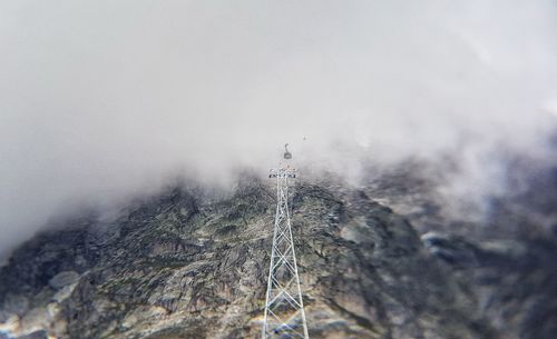 Scenic view of snow covered mountain against sky