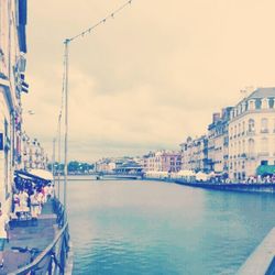 Boats moored in canal