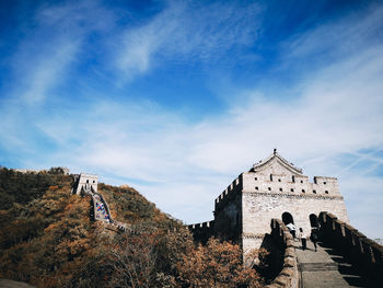 Historic building against cloudy sky