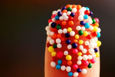 Close-up of multi colored pencils over black background