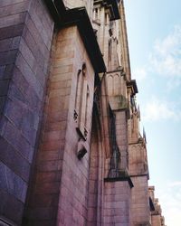 Low angle view of statue against sky