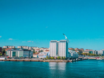 Buildings in city at waterfront