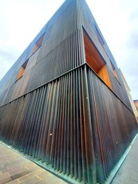 Low angle view of modern building against sky