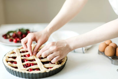 Close-up of woman preparing food