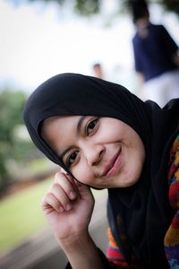 Portrait of a smiling young woman