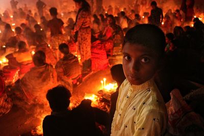 A boy is looking at camera at rakher upobash barodi lokhnath brahmachari ashram