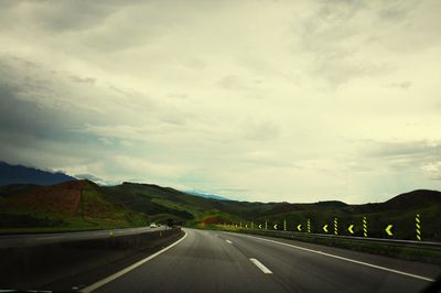 Country road passing through mountains