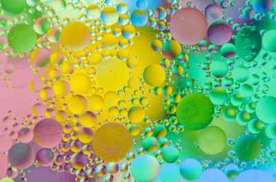 Close-up of colorful bubbles in water