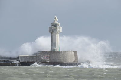 View of waves in sea against sky