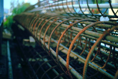 Close-up of spiral metallic structure at construction site