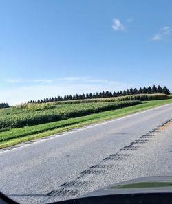 Country road seen through car windshield