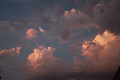 Low angle view of clouds in sky during sunset