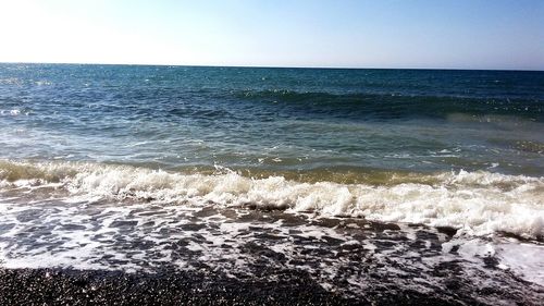 Scenic view of sea against clear sky