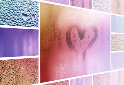 Close-up of heart shape on glass against wall