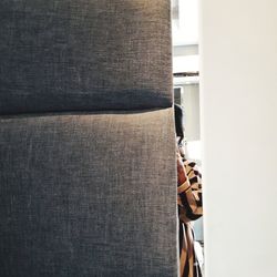 Close-up of sofa against wall