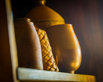 Close-up of lit tea light candles on table