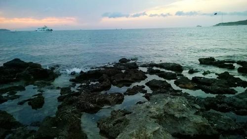 Scenic view of sea against sky during sunset