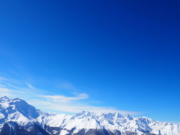 Scenic view of snow covered mountains