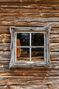 Close-up of old window of abandoned building