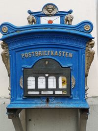 Close-up of mailbox on wall