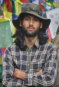 Portrait of young man wearing hat