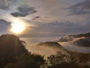 Scenic view of mountains against sky during sunset