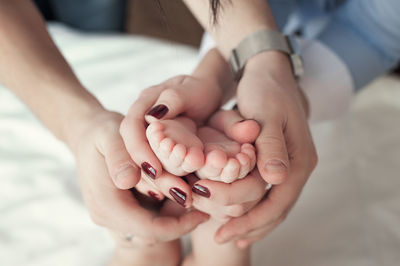 Close-up of woman holding hands